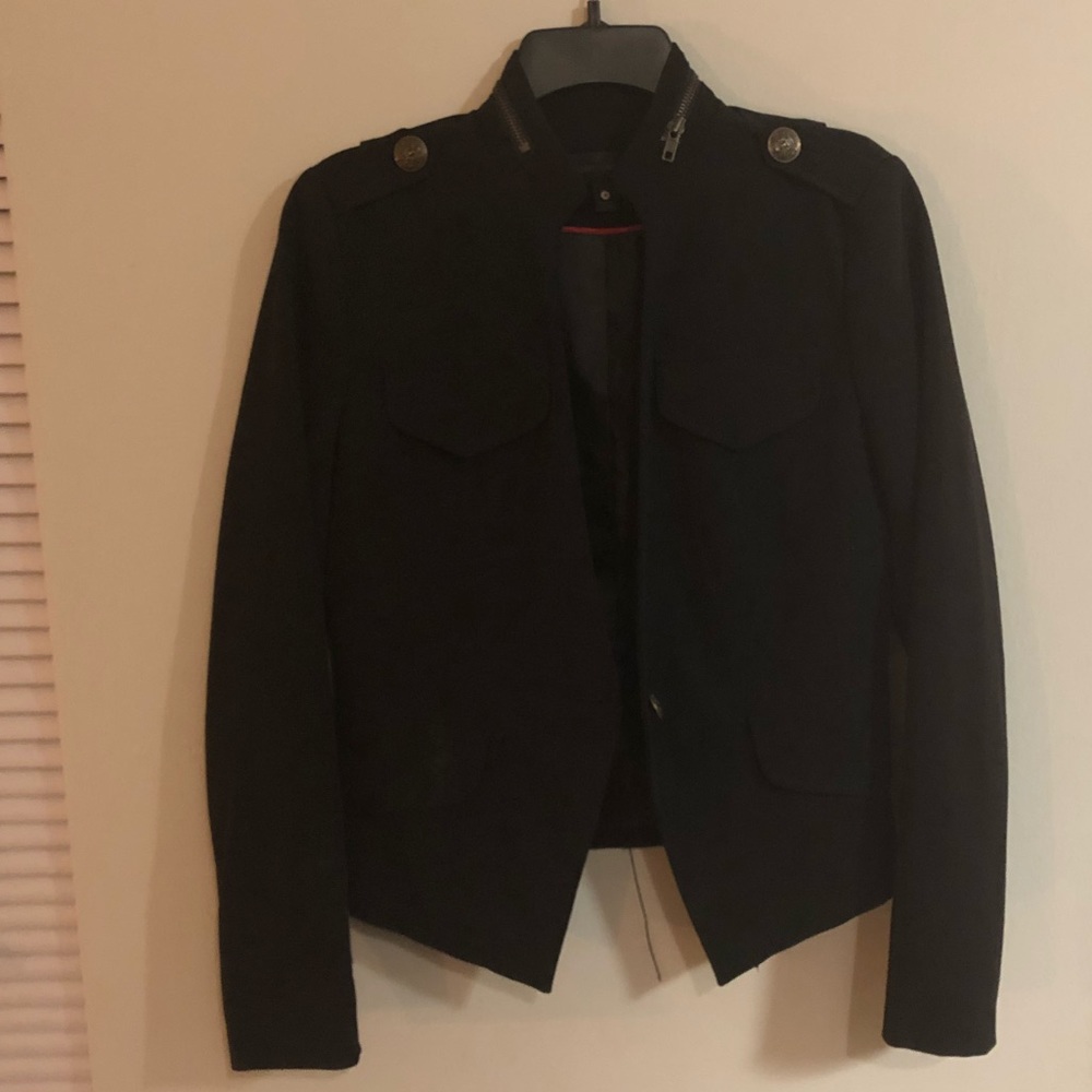 Black blazer with cool details.